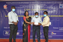 Dr.S.M.Abhinaya, Sr.Consultant(CSR) and Sr.Advocate (Madras High Court)    giving  Scholarship to students under CSR initiative of United Way, Chennai