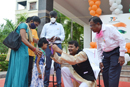 Director Distributing Prizes to PwDs